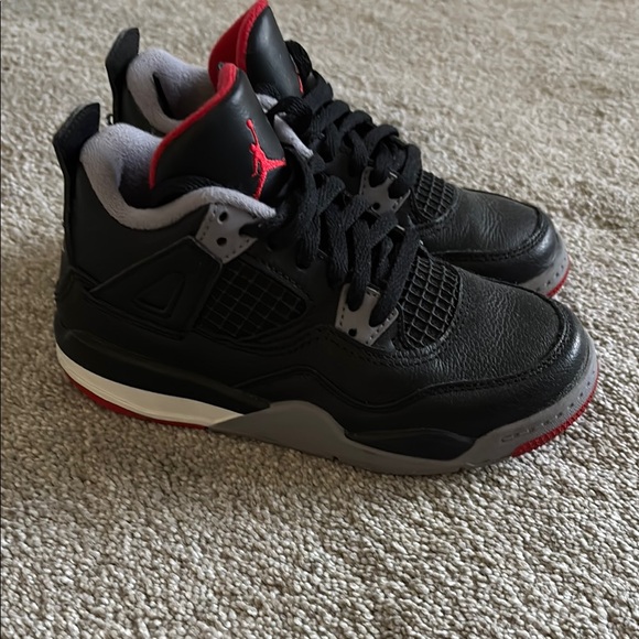 Nike Black and Red Sneakers with Classic AJ4 Design - Picture 2 of 4